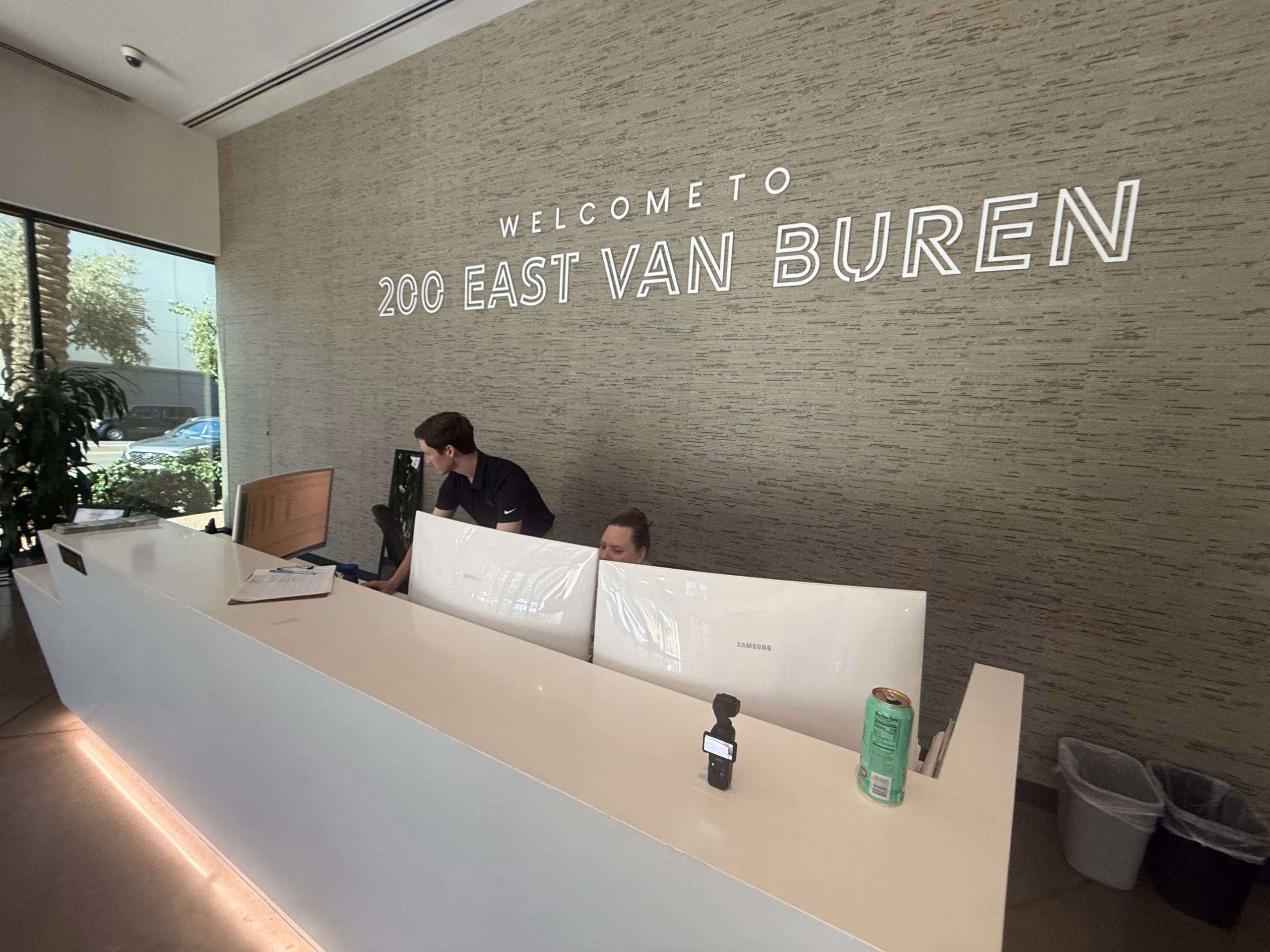 MBPS reception desk with Welcome to 200 East Van Buren signage