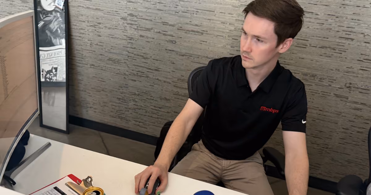 MBPS team member working at a desk in the Phoenix office