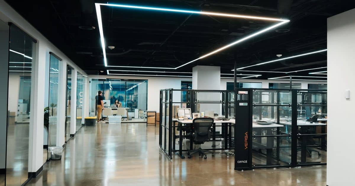 Modern enterprise office with glass-walled meeting rooms