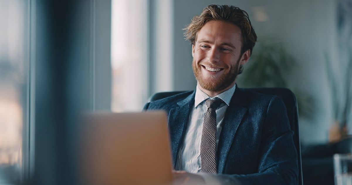 Professional services client working on a laptop